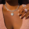 Iced out heart necklace